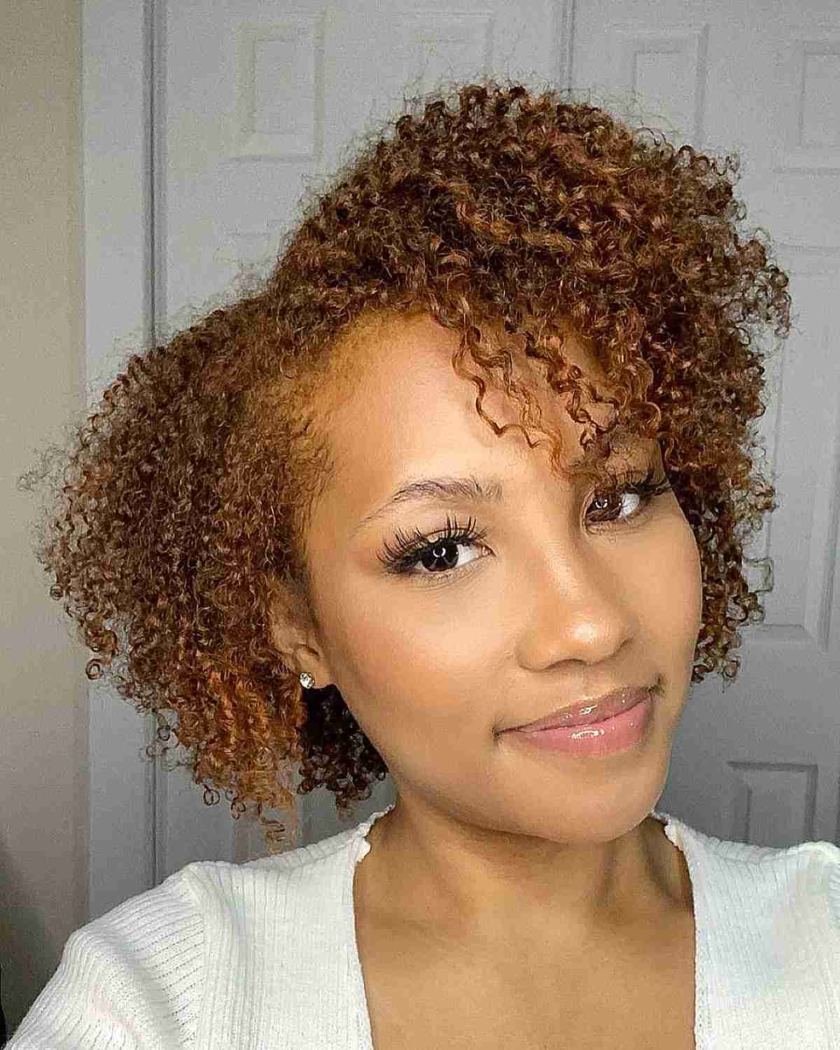 A cropped coily bob hairstyle for black women