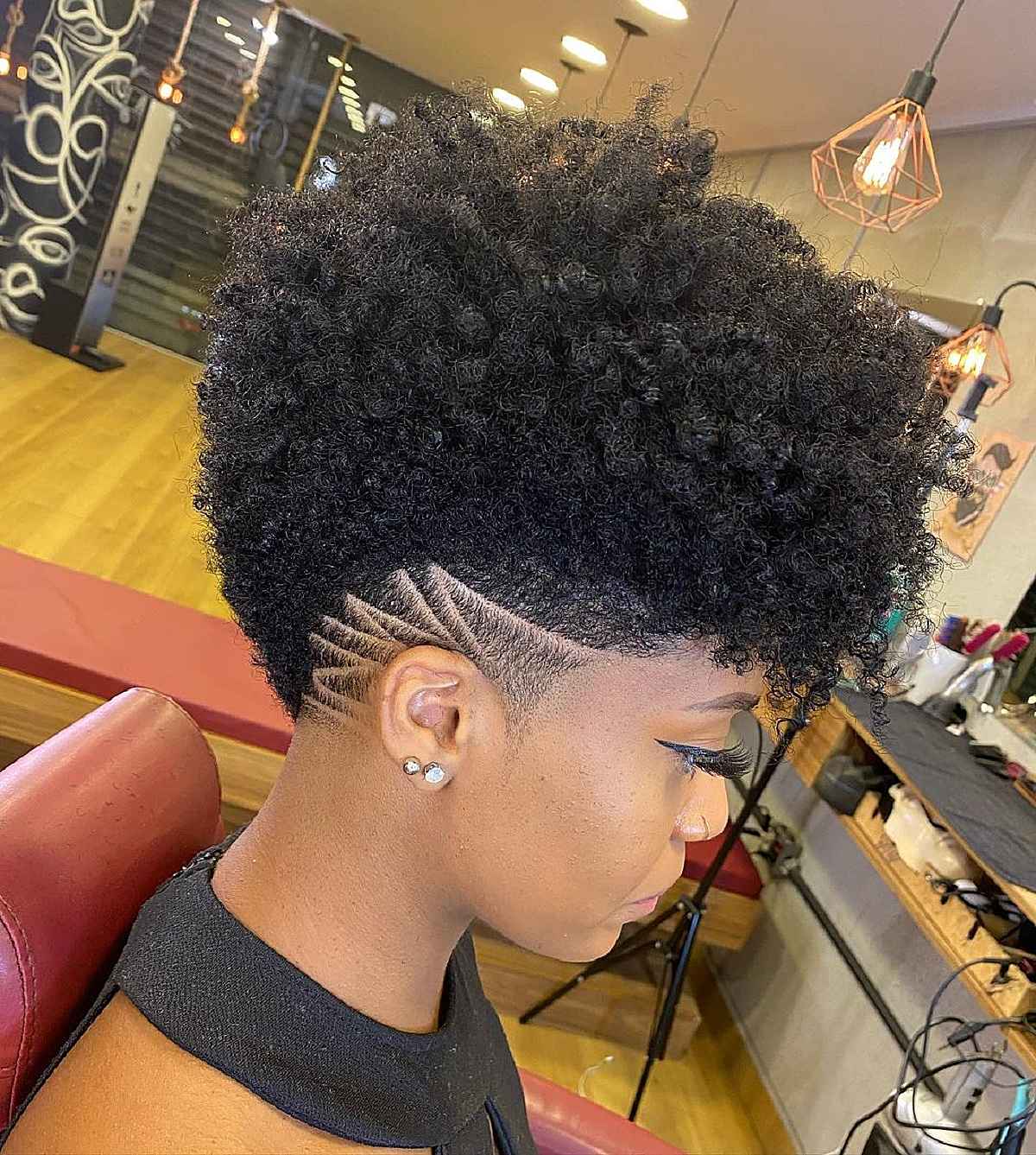 Haircut featuring twist out style with shaved temples