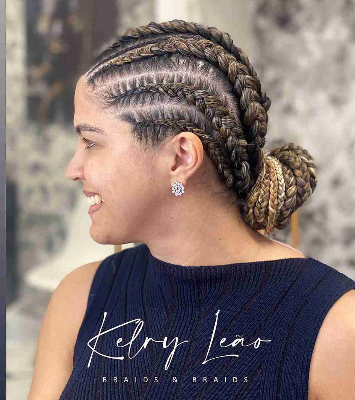 Ghana Braids with Highlights Styled in a Low Bun