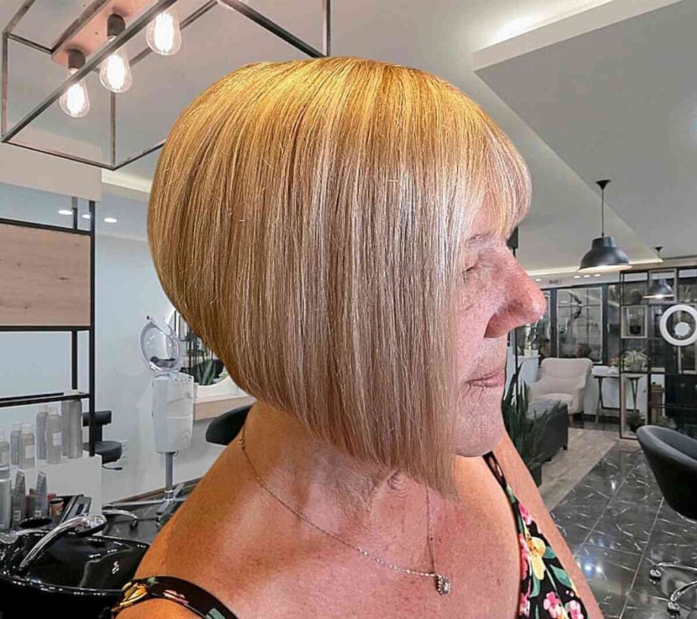 A wedge bob in a blonde shade with delicate, thin bangs