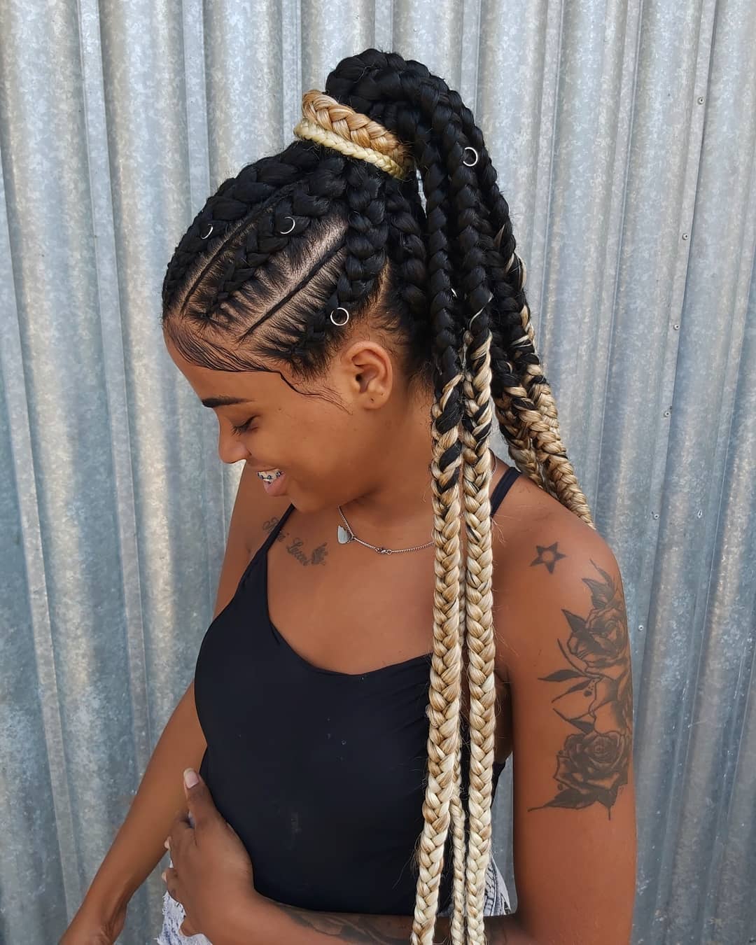 Ghana braid hairstyle pulled halfway up