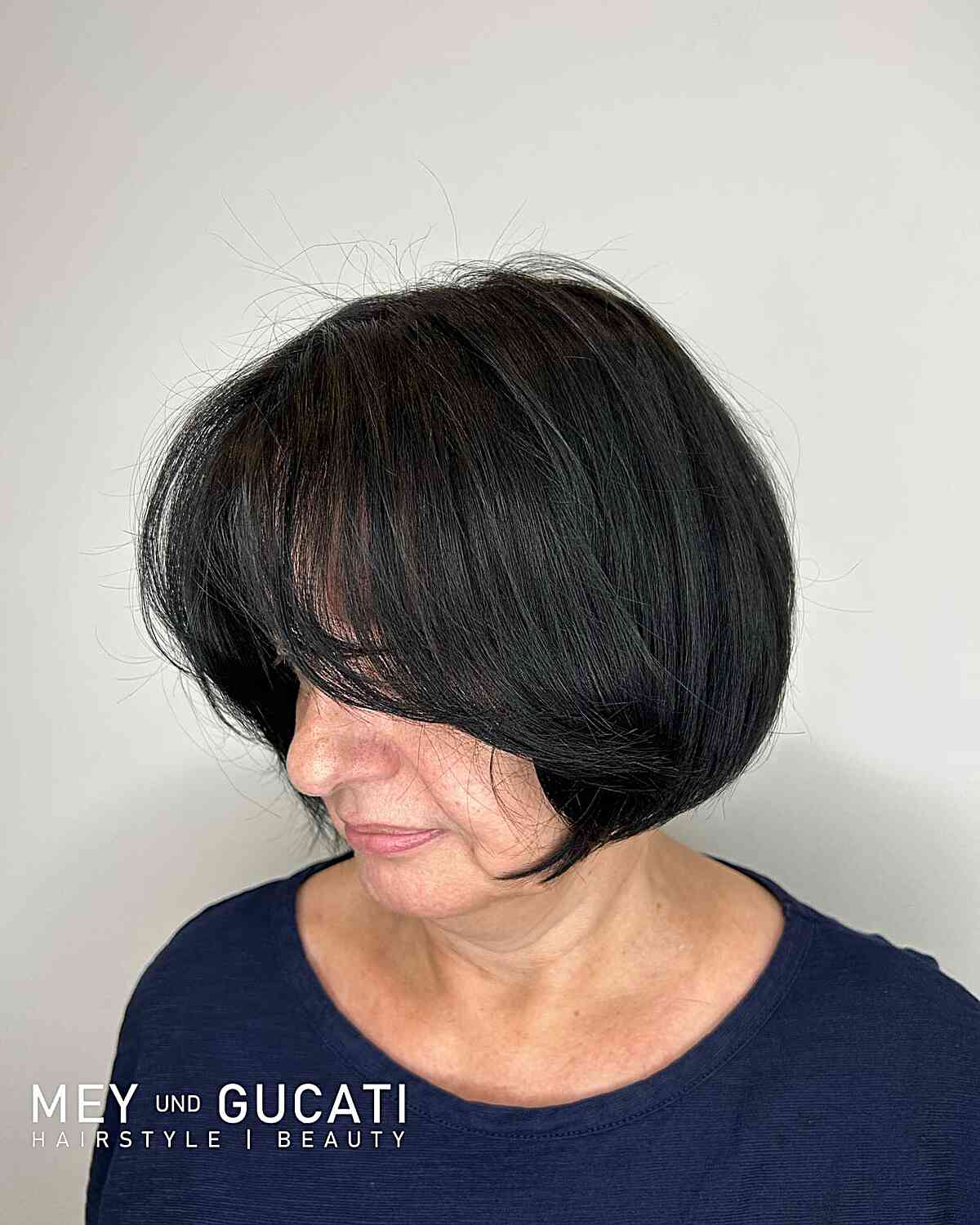 Circular haircut with bangs that frame the face