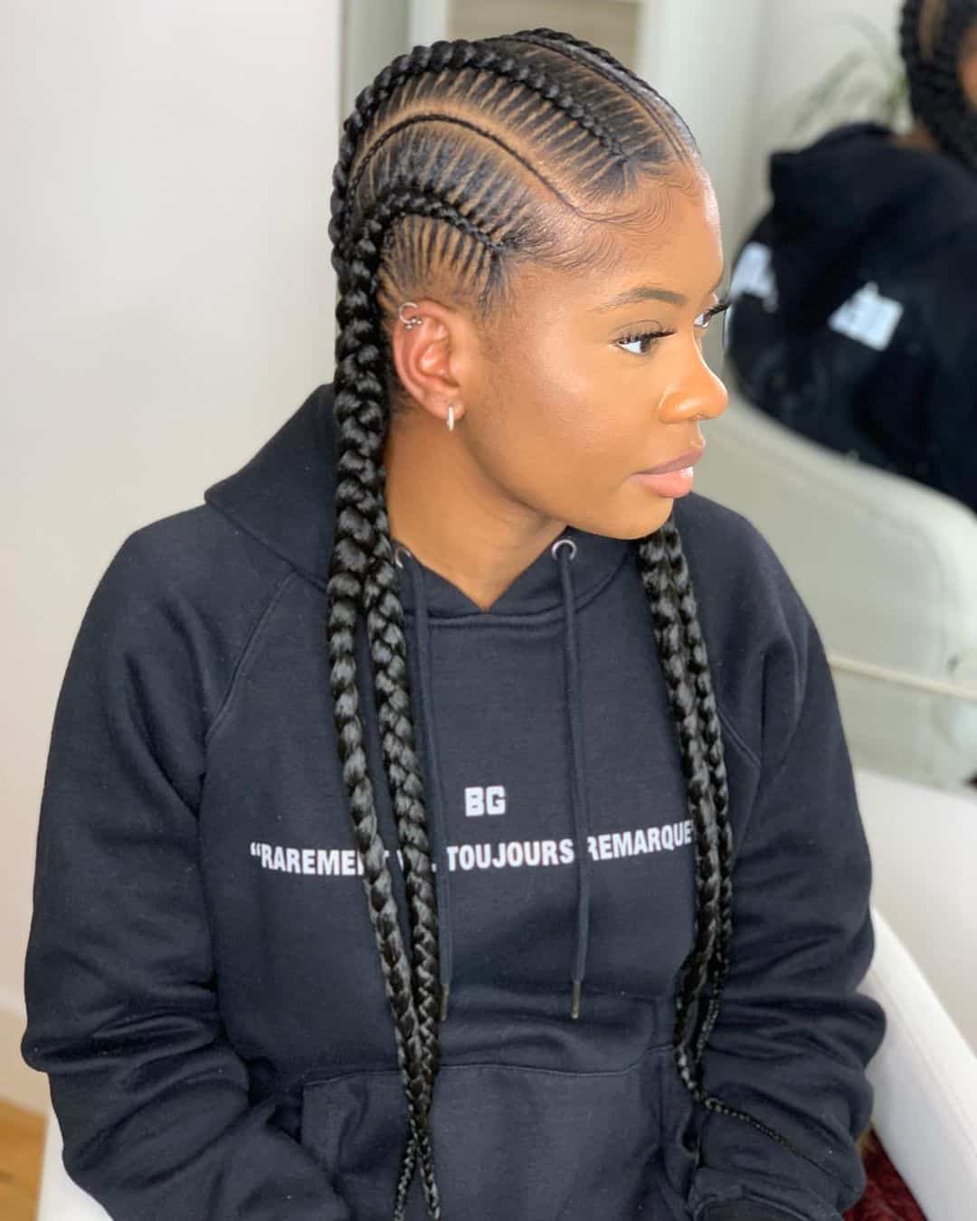 Ghana braids styled with straight-back technique