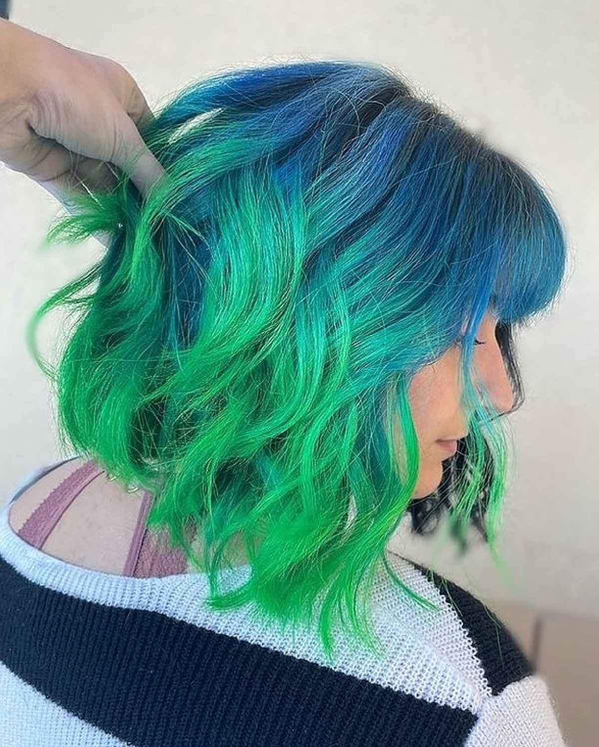 Hair color that is a combination of blue and green