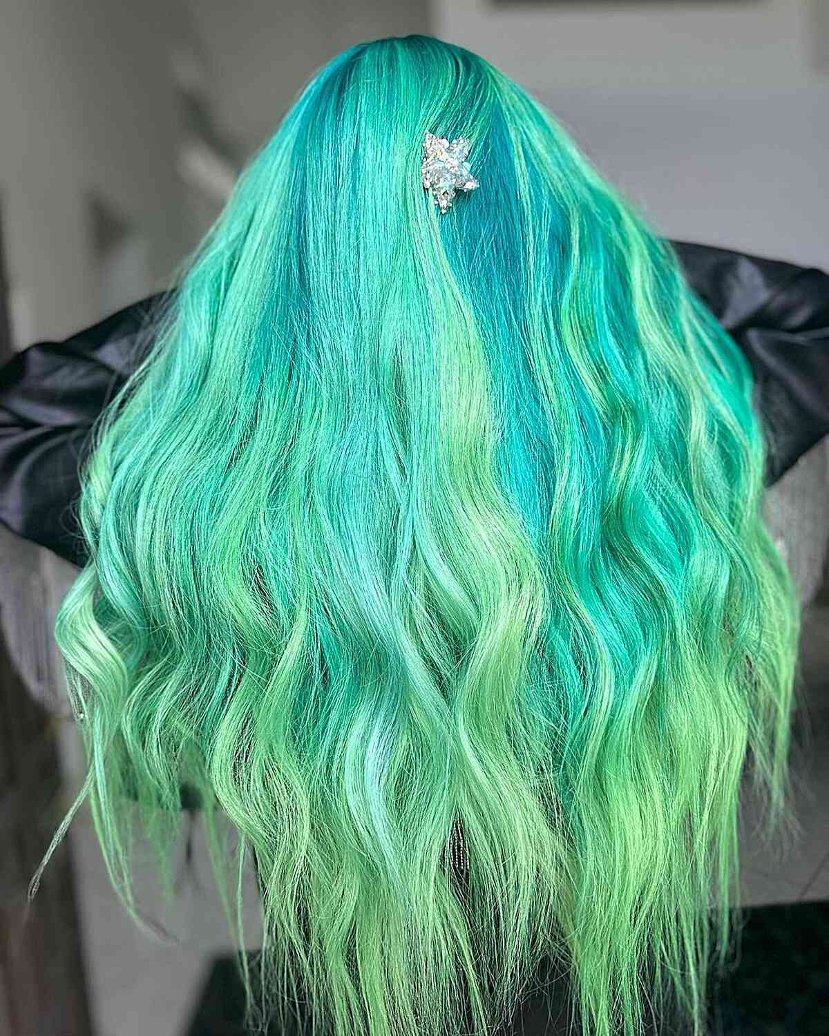 Hair color reminiscent of a mermaid’s tail in shades of green