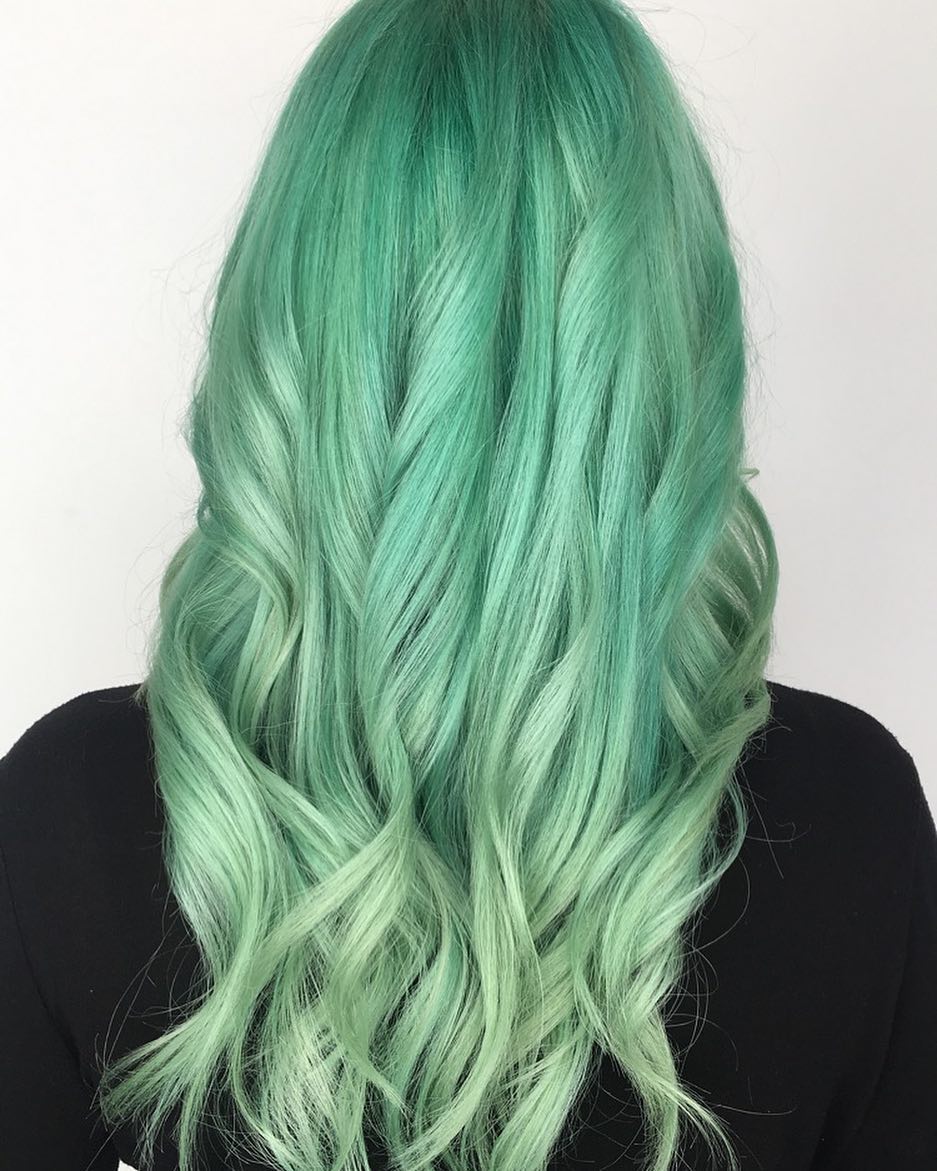 A soft green hair color tone