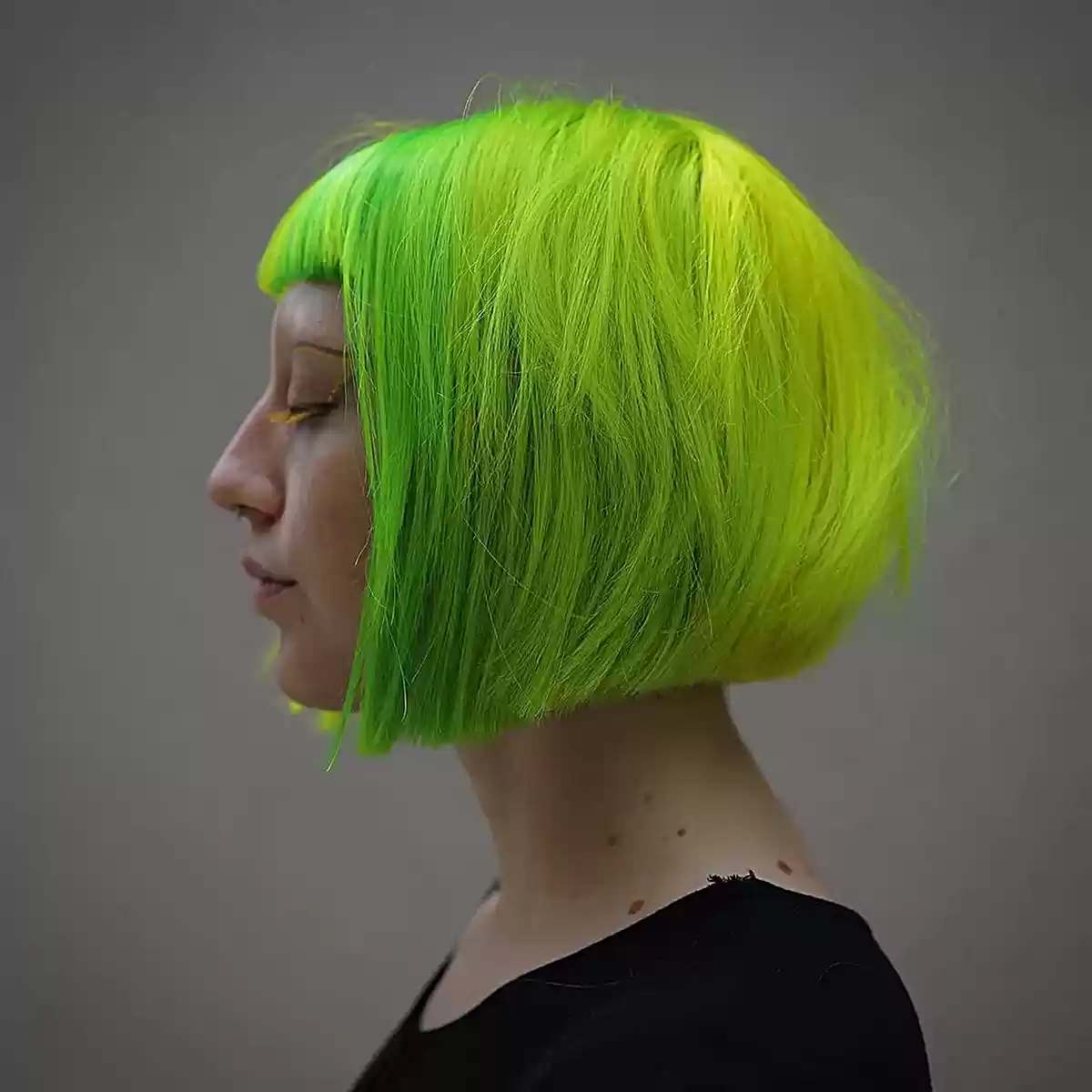 Vibrant Neon Green on a Sleek Bob Hairstyle