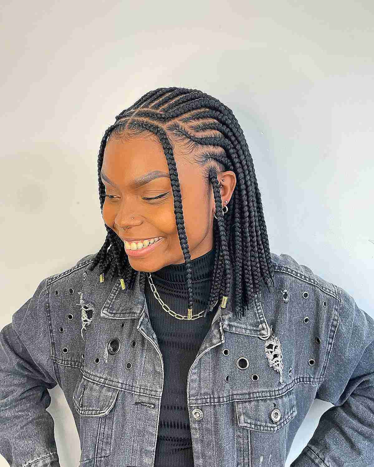 Braided Bob with a Center Part and Face-Framing Strands