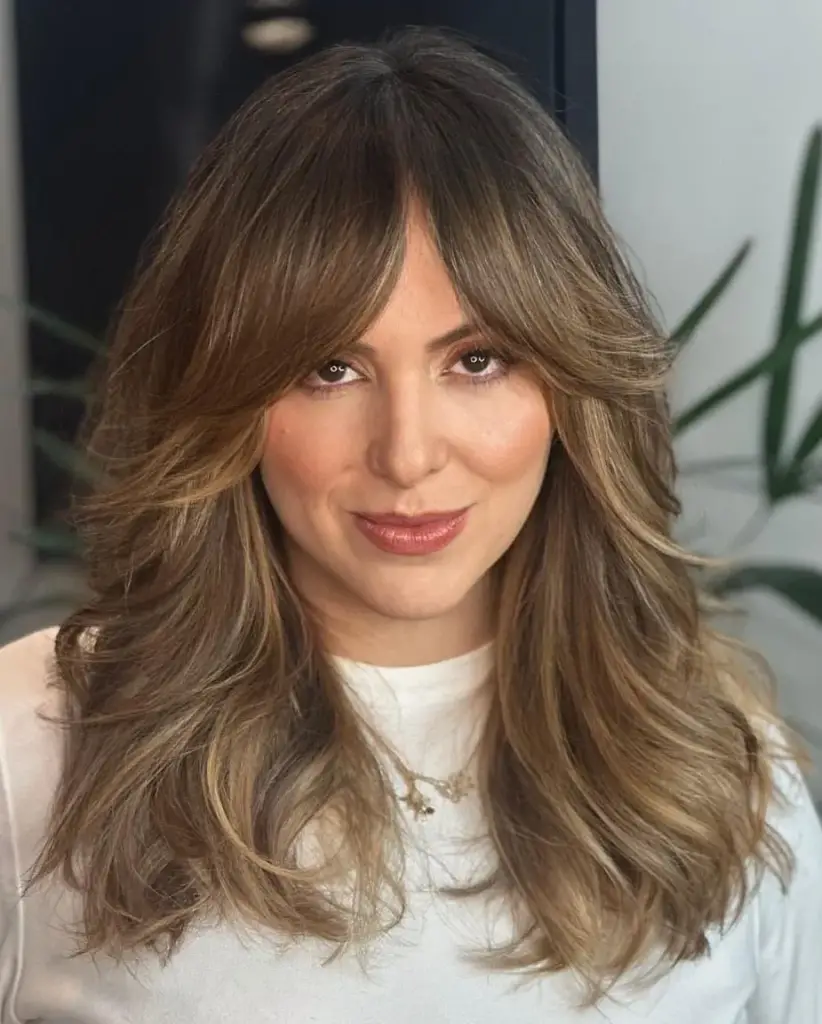Styling Medium-Length Hair with Curtain Bangs and Layers