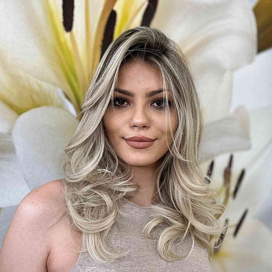 Blonde Hair with Dark Root Balayage and Layers