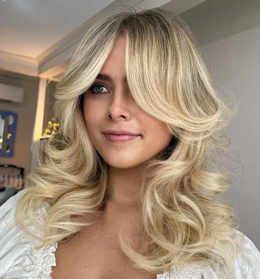 Vibrant Blonde Layered Hairstyle with Babylights