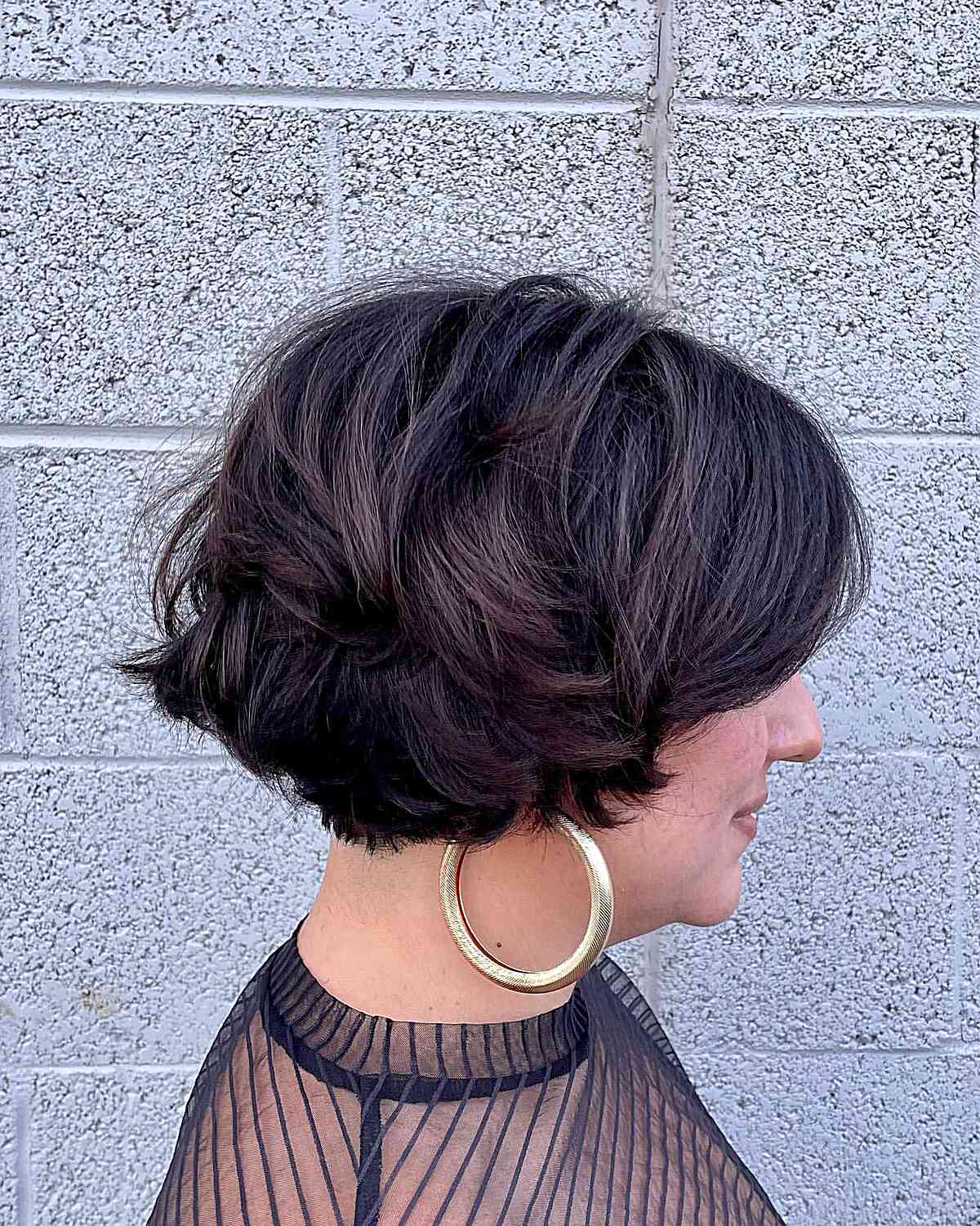 Feathered French Bob with a Side Part