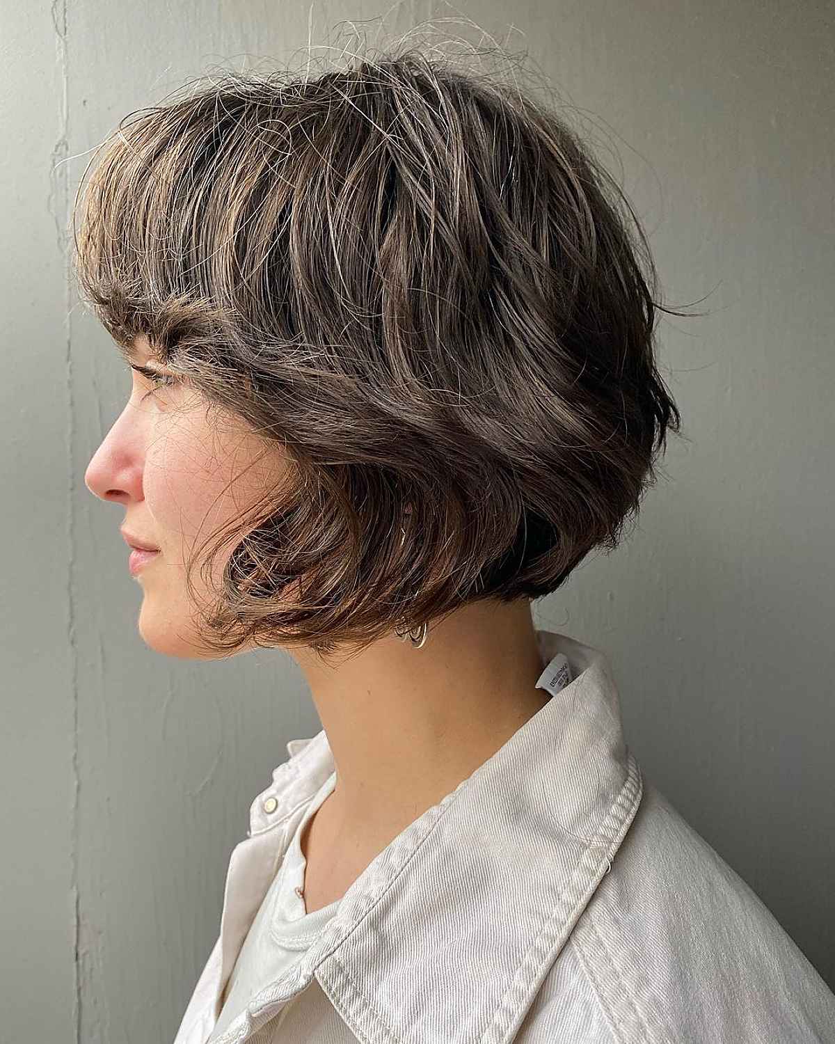Pixie Cut with Face-Framing Layers and Highlights