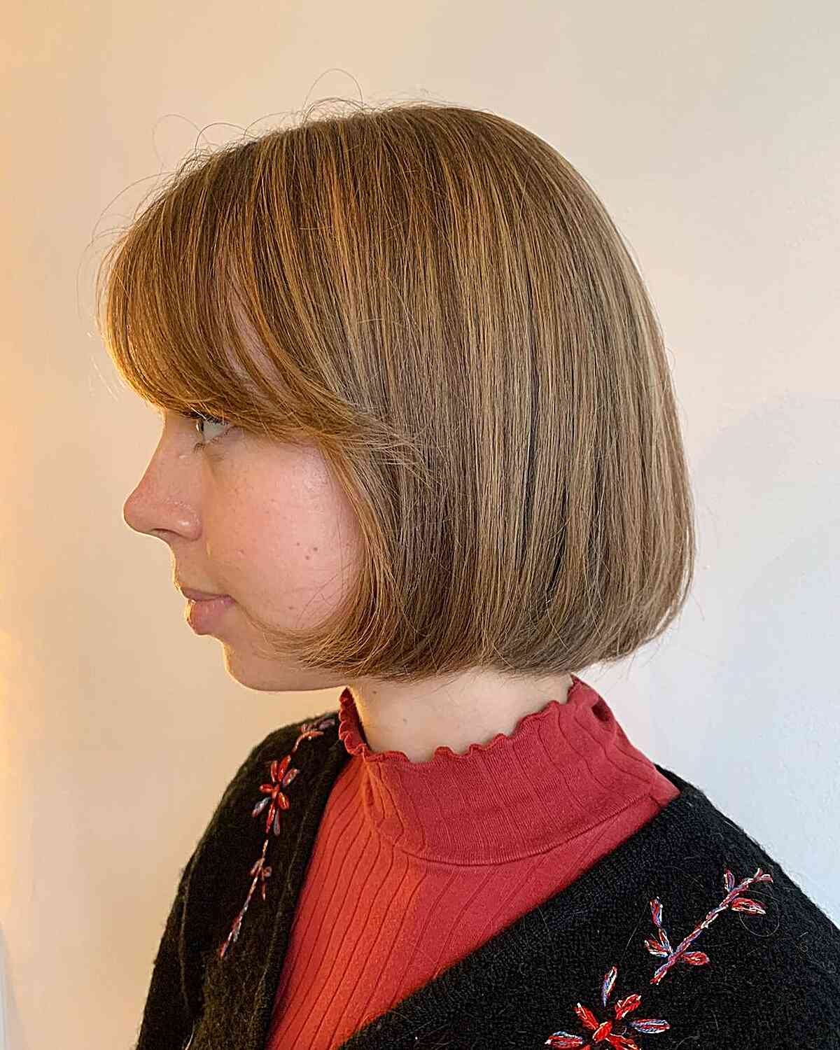 Round Bob with Side-Swept Bangs