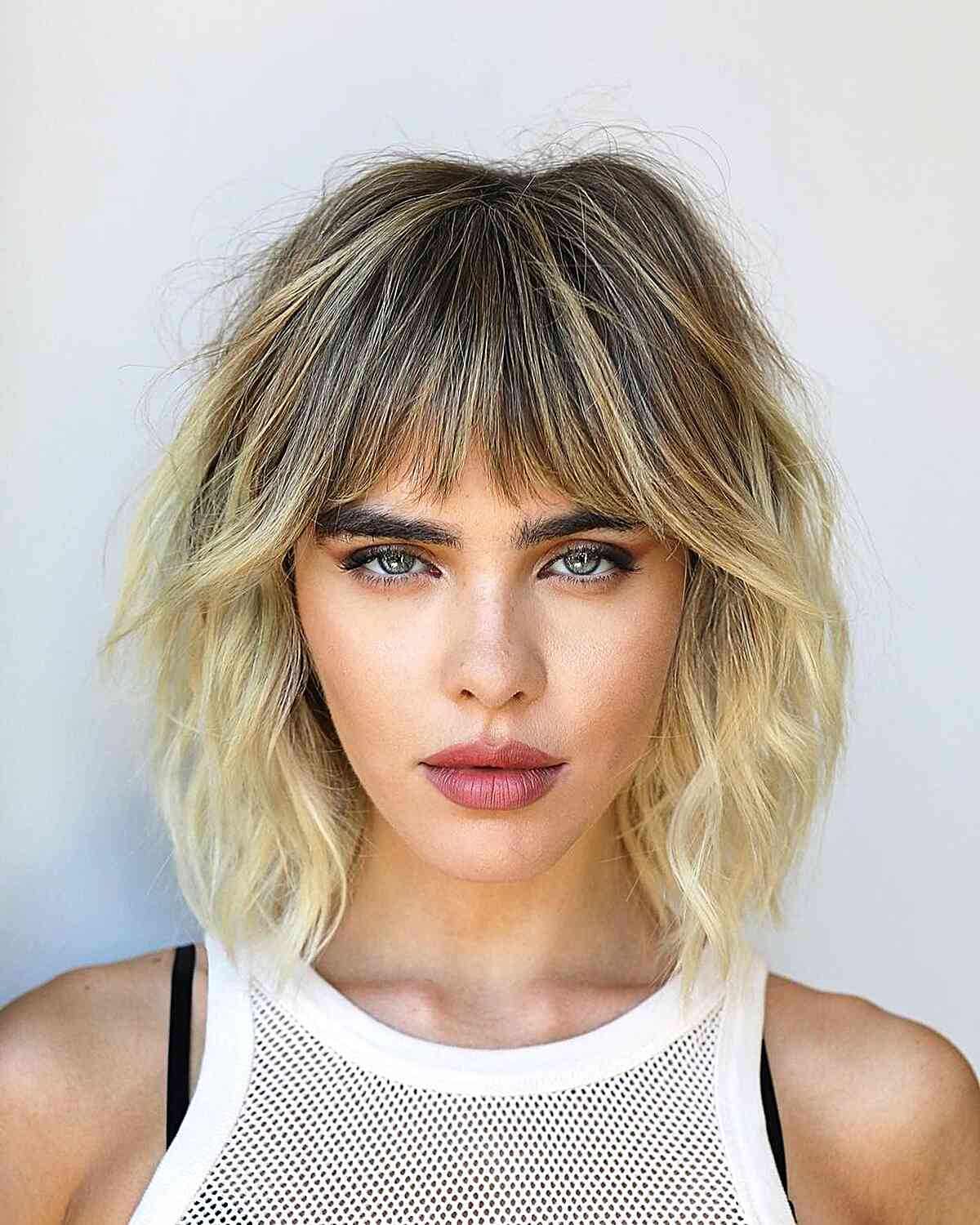 Short Bangs Paired with a Gentle Shag