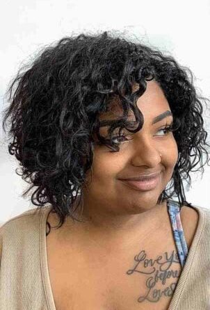 Radiant Naturally Curly A-Line Bob Hairstyle Suited for Dark Complexions