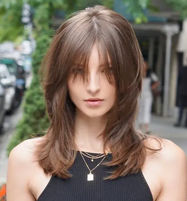 Layers with a Piece-y Texture and Elongated Bangs