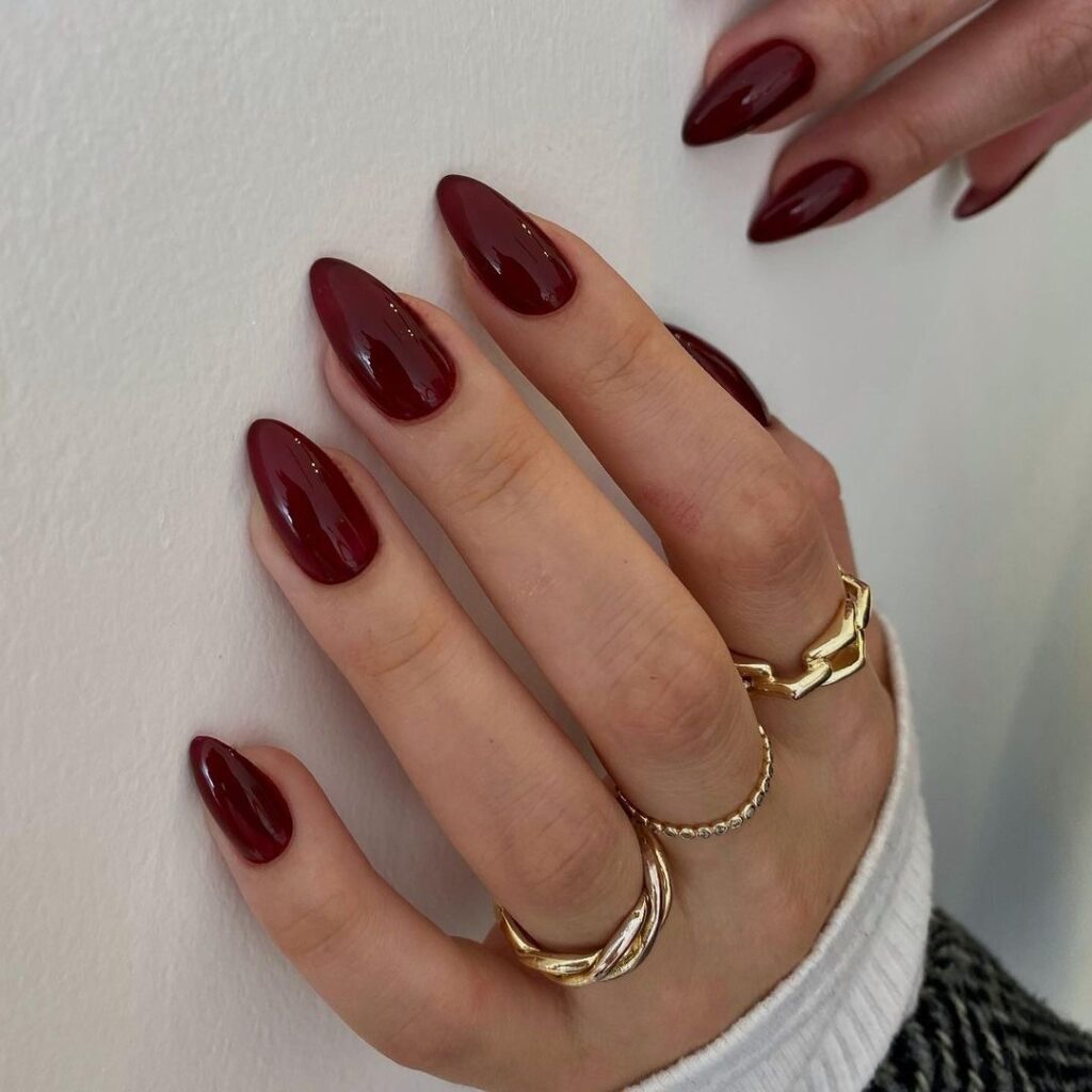 Romantic Red Valentine's Day Manicure with Heart Accents for a Sentimental Look