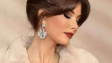 Elegant Brunette Updo with Soft Curtain Bangs